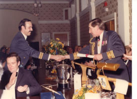 Bob receiving his tp certificate, 1983